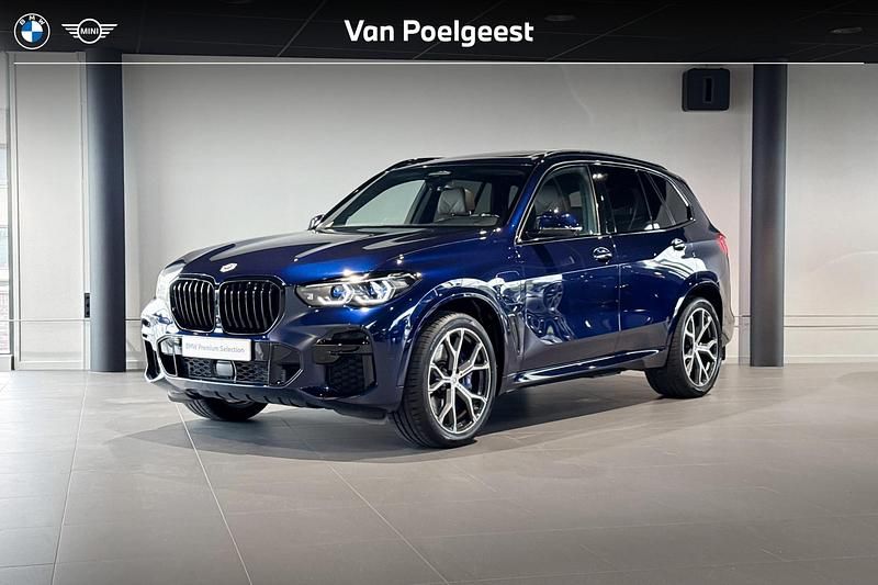 Bmw individual tansanit metallic (c3z) (blauw metallic) Gebruikt 2023 BMW X5 Executive SUV | € 74.900 (Eerlijke prijs) - Afbeelding 1/4