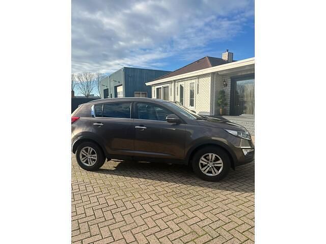 Bruin Gebruikt 2013 Kia Sportage Plus SUV | € 4.999 (Eerlijke prijs) - Afbeelding 1/4