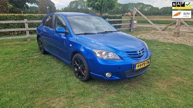Blauw Gebruikt 2005 Mazda 3 Active Hatchback | € 2.500 (Eerlijke prijs) - Afbeelding 1/4