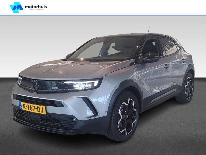 Grijs Gebruikt 2022 Opel Mokka-e Ultimate SUV | € 23.970 (Duur) - Afbeelding 1/4