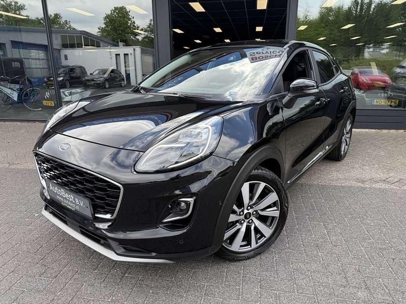 Zwart, metallic lak Gebruikt 2021 Ford Puma Gen-E SUV | € 17.950 (Goede deal) - Afbeelding 1/4