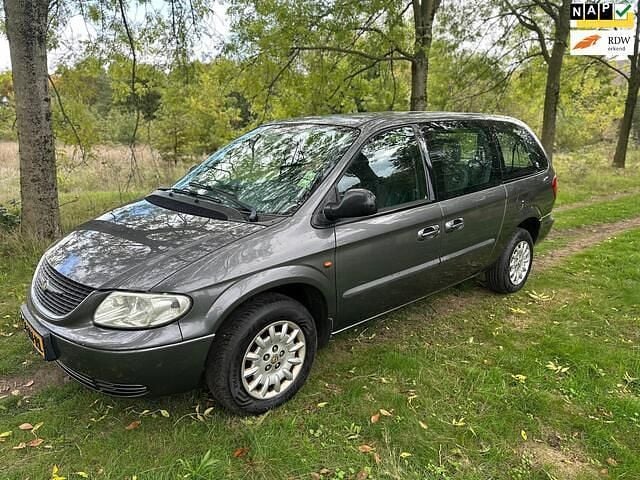 Grijs Gebruikt 2004 Chrysler Grand Voyager MPV | € 2.950 (Eerlijke prijs) - Afbeelding 1/4