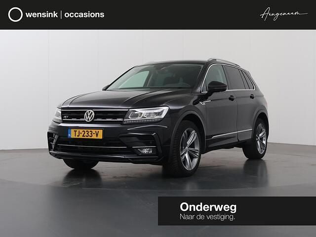 Zwart Gebruikt 2018 VW Tiguan Highline SUV | € 27.945 (Eerlijke prijs) - Afbeelding 1/4