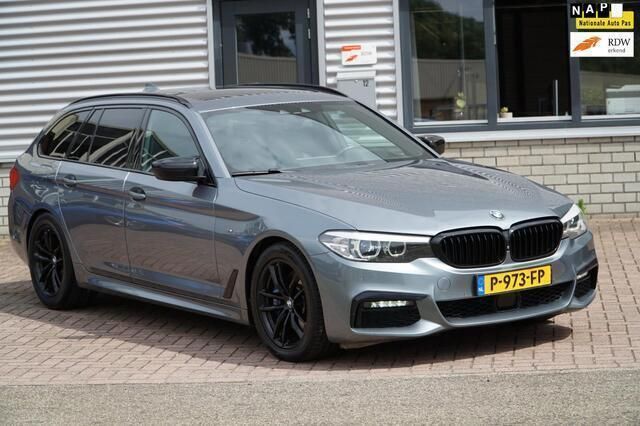 Grijs, metallic lak Gebruikt 2019 BMW 530 Executive Stationwagen | € 31.850 (Goede deal) - Afbeelding 1/4