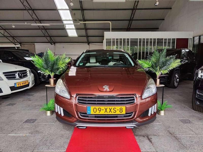 Oranje Gebruikt 2012 Peugeot 508 RXH Stationwagen | € 5.500 - Afbeelding 1/3