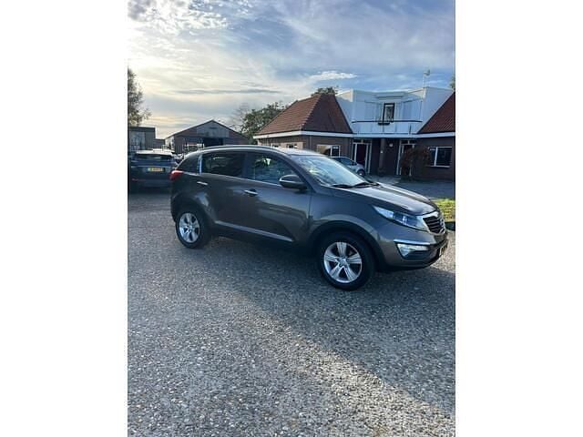 Bruin Gebruikt 2013 Kia Sportage Plus SUV | € 8.450 (Eerlijke prijs) - Afbeelding 1/4