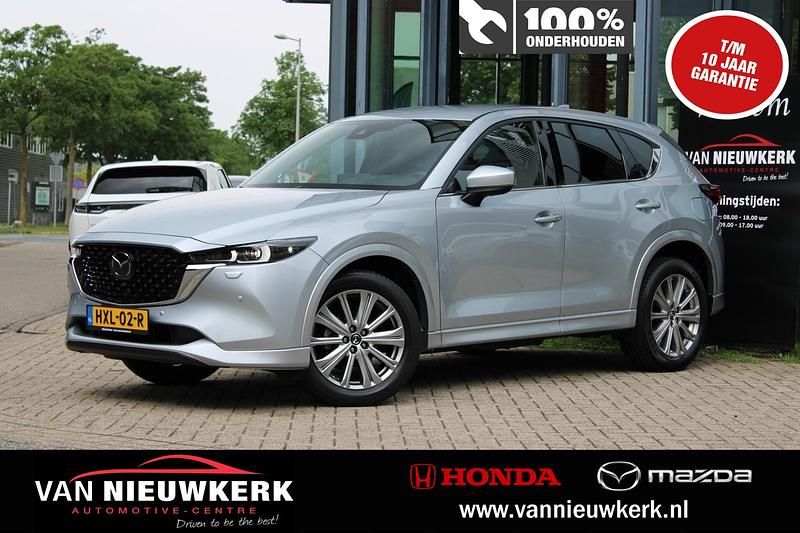 Sonic silver (grijs metallic) Gebruikt 2022 Mazda CX-5 Signature SUV | € 34.400 (Eerlijke prijs) - Afbeelding 1/4