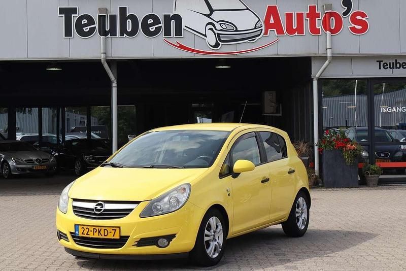 Geel Gebruikt 2011 Opel Corsa Edition Hatchback | € 2.395 (Goede deal) - Afbeelding 1/4