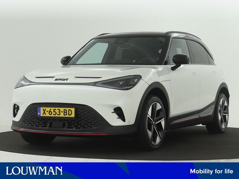 096 digital white metallic (licht wit metallic) Gebruikt 2023 Smart #1 Brabus SUV | € 35.445 (Iets duurder) - Afbeelding 1/4