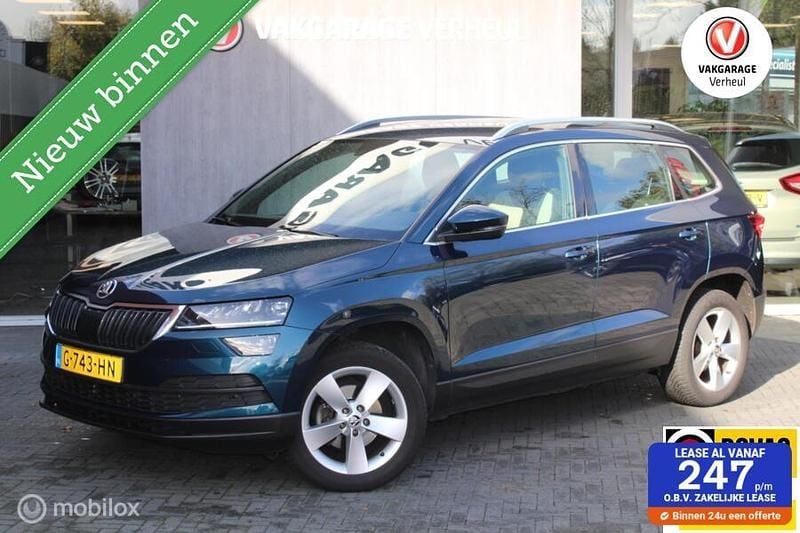 Blauw metallic Gebruikt 2019 Skoda Karoq Business Line SUV | € 18.495 (Eerlijke prijs) - Afbeelding 1/3