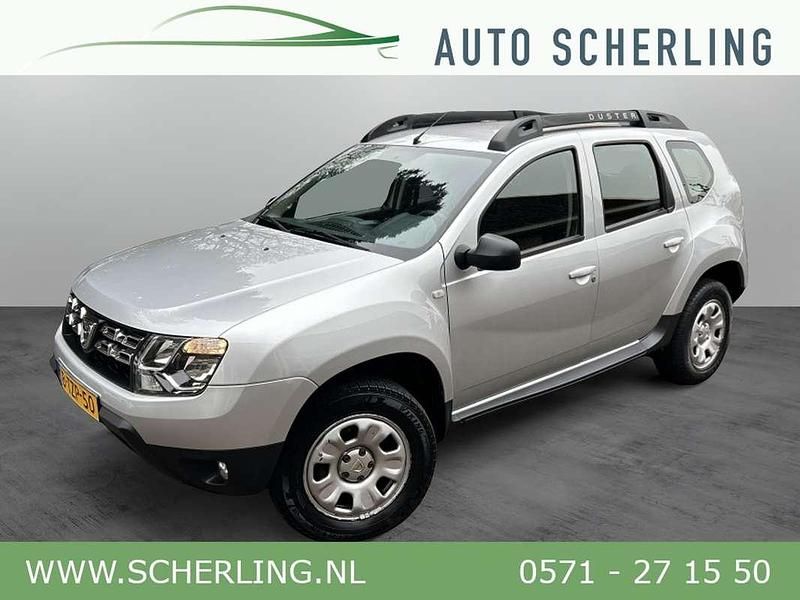 Grijs, metallic lak Gebruikt 2014 Dacia Duster Lauréate SUV | € 8.950 (Eerlijke prijs) - Afbeelding 1/4