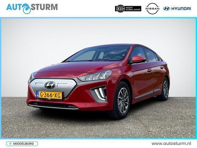 Pulse red Gebruikt 2019 Hyundai Ioniq Comfort Sedan | € 14.390 (Eerlijke prijs) - Afbeelding 1/4