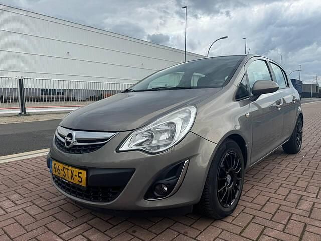 Bruin Gebruikt 2011 Opel Corsa Hatchback | € 1.999 (Eerlijke prijs) - Afbeelding 1/4