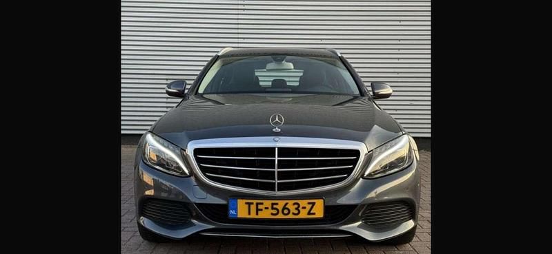 Grijs Occasion 2015 Mercedes C200 Prestige Stationwagen | € 11.500 (Eerlijke prijs) - Afbeelding 1/4