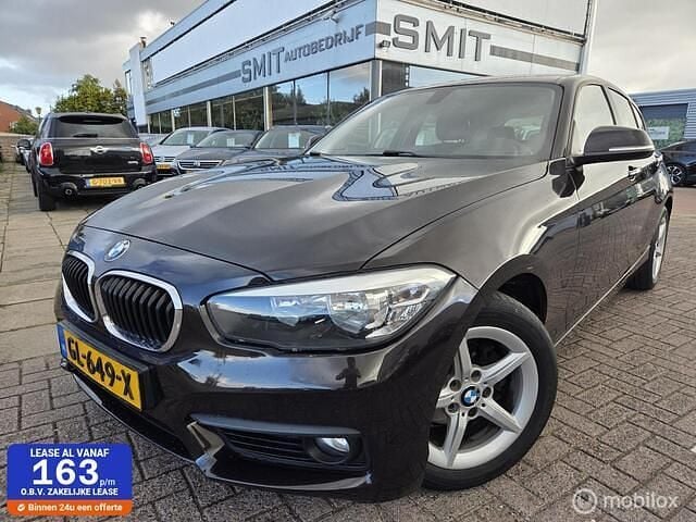 Bruin Gebruikt 2015 BMW 116 Comfort Edition Hatchback | € 9.900 (Eerlijke prijs) - Afbeelding 1/4