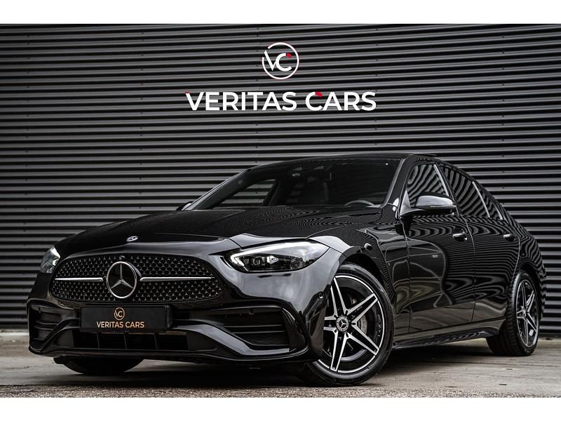 Zwart Occasion 2022 Mercedes C200 AMG line Sedan | € 38.950 (Iets duurder) - Afbeelding 1/4