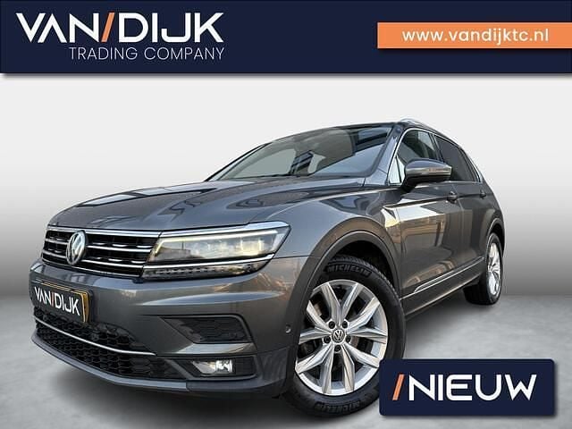 Grijs Gebruikt 2017 VW Tiguan Highline SUV | € 15.940 (Goede deal) - Afbeelding 1/4