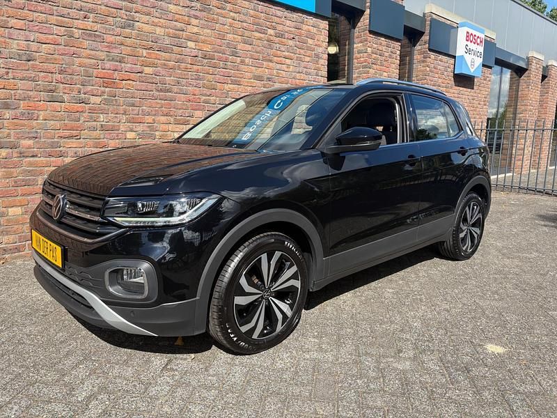 Zwart Gebruikt 2021 VW T-Cross Style SUV | € 22.755 (Eerlijke prijs) - Afbeelding 1/4