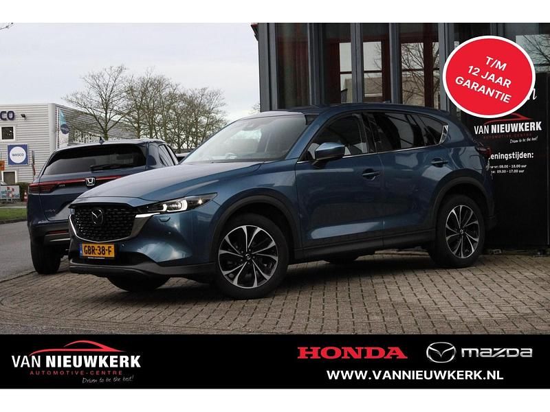 Blauw Gebruikt 2024 Mazda CX-5 Exclusive-Line SUV | € 39.900 (Eerlijke prijs) - Afbeelding 1/4