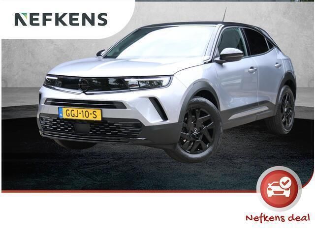 Grijs Gebruikt 2024 Opel Mokka SUV | € 29.920 - Afbeelding 1/4