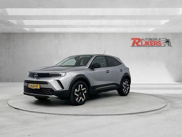 Grijs Gebruikt 2023 Opel Mokka SUV | € 17.999 (Goede deal) - Afbeelding 1/4