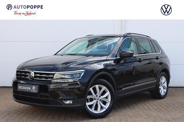 Zwart Gebruikt 2019 VW Tiguan Comfortline SUV | € 26.950 (Goede deal) - Afbeelding 1/4