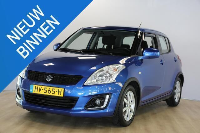 Blauw, metallic lak Gebruikt 2016 Suzuki Swift Hatchback | € 9.950 (Eerlijke prijs) - Afbeelding 1/4