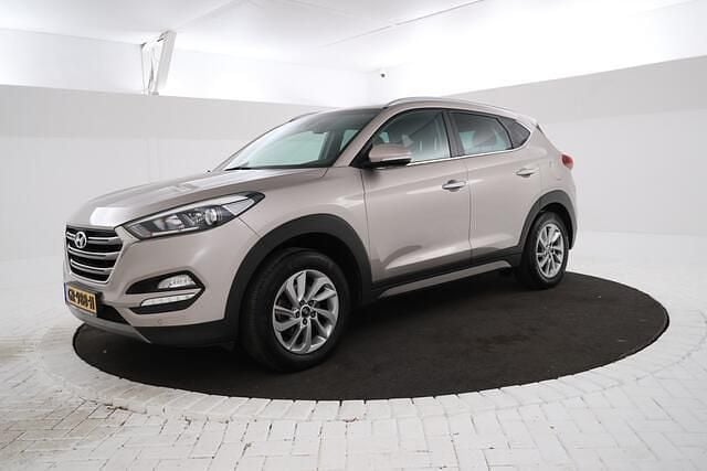 Beige Gebruikt 2015 Hyundai Tucson Comfort SUV | € 13.995 (Eerlijke prijs) - Afbeelding 1/4