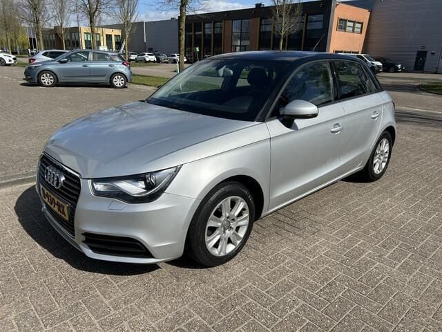 Grijs Gebruikt 2012 Audi A1 Ambition Hatchback | € 8.495 (Eerlijke prijs) - Afbeelding 1/4