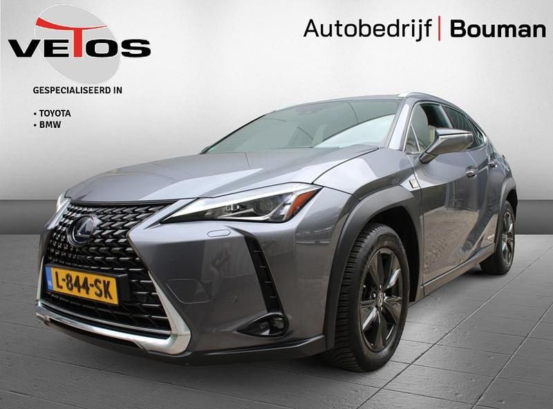 Grijs Gebruikt 2019 Lexus UX 300e Business Edition SUV | € 24.950 - Afbeelding 1/3