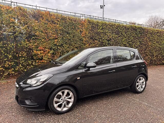 Zwart Gebruikt 2015 Opel Corsa Edition Hatchback | € 5.950 (Eerlijke prijs) - Afbeelding 1/4