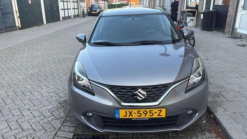 Grijs Gebruikt 2016 Suzuki Baleno Hatchback | € 6.000 - Afbeelding 1/4