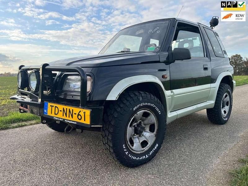 Zwart Gebruikt 1998 Suzuki Vitara Cabriolet | € 2.500 - Afbeelding 1/4