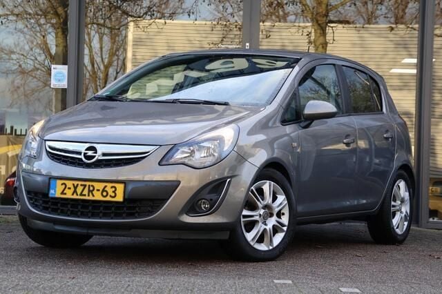 Bruin Gebruikt 2014 Opel Corsa Hatchback | € 6.995 (Iets duurder) - Afbeelding 1/4