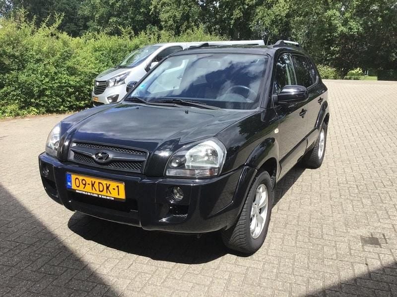 Zwart, andere lak Gebruikt 2009 Hyundai Tucson Style SUV | € 4.950 (Eerlijke prijs) - Afbeelding 1/4