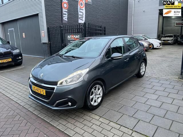 Grijs, metallic lak Gebruikt 2016 Peugeot 208 Hatchback | € 4.999 (Eerlijke prijs) - Afbeelding 1/4