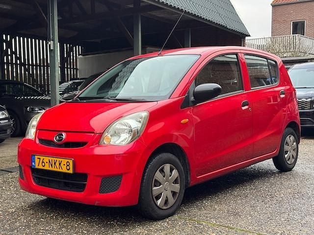 Occasion Daihatsu Cuore 69 PK (50 kW) 2010 Rood Hatchback