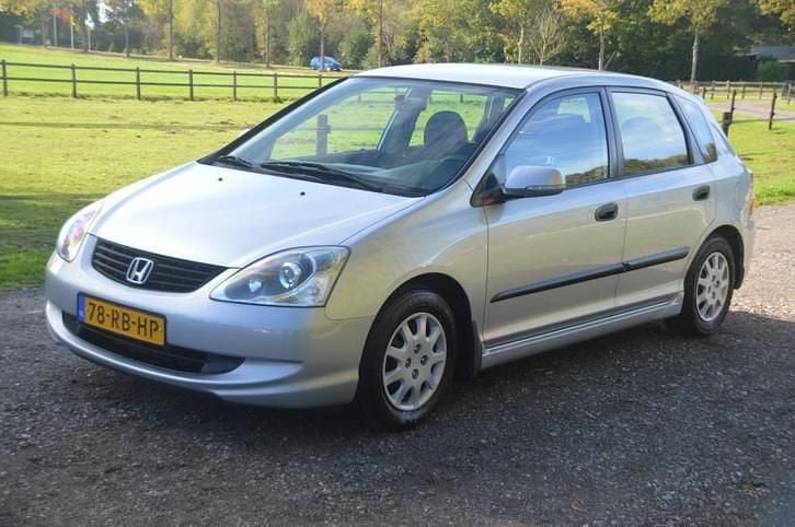 Grijs (metallic) Gebruikt 2005 Honda Civic LS Hatchback | € 2.950 (Iets duurder) - Afbeelding 1/4