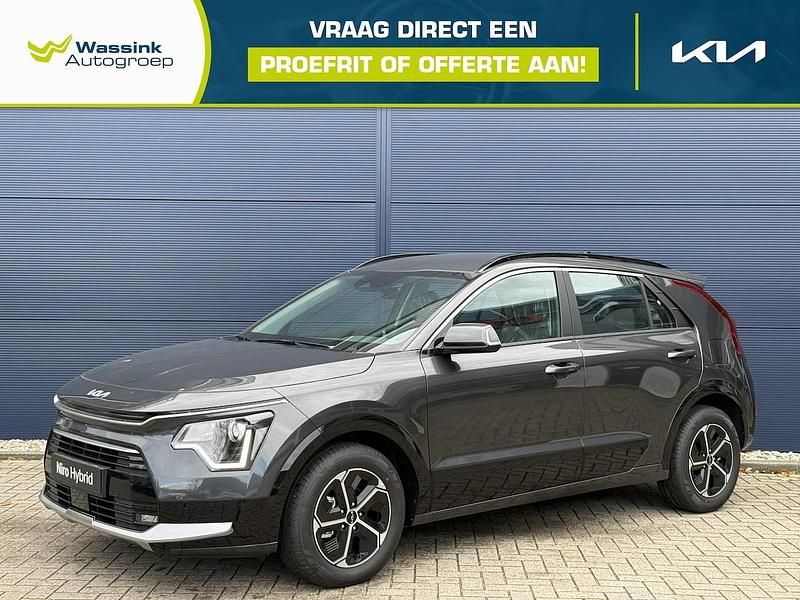 Grijs (metallic) Nieuw 2025 Kia Niro SUV | € 32.830 (Super prijs) - Afbeelding 1/4