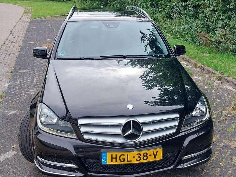 Zwart Occasion 2011 Mercedes C180 Stationwagen | € 10.500 (Iets duurder) - Afbeelding 1/4