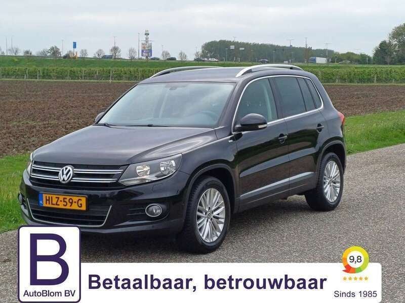 Grijs Gebruikt 2014 VW Tiguan Sport SUV | € 14.995 (Eerlijke prijs) - Afbeelding 1/4