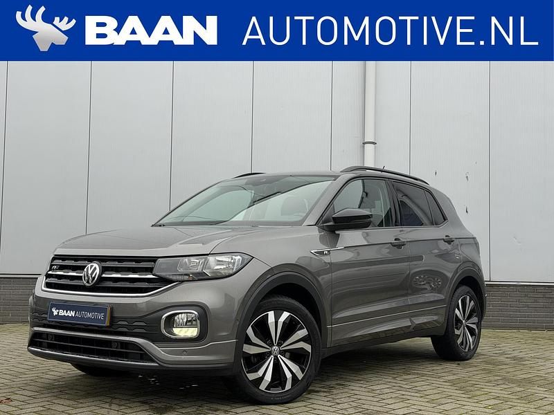 Grijs (metallic) Occasion 2020 VW T-Cross R-line SUV | € 17.395 (Duur) - Afbeelding 1/4