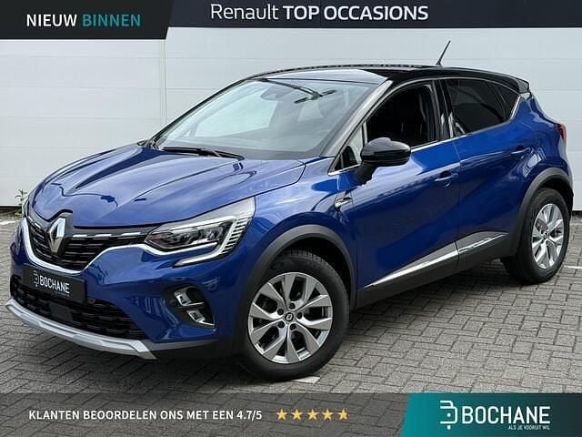 Twotone bleu iron / noir etoi Gebruikt 2021 Renault Captur Intens SUV | € 19.445 (Goede deal) - Afbeelding 1/4