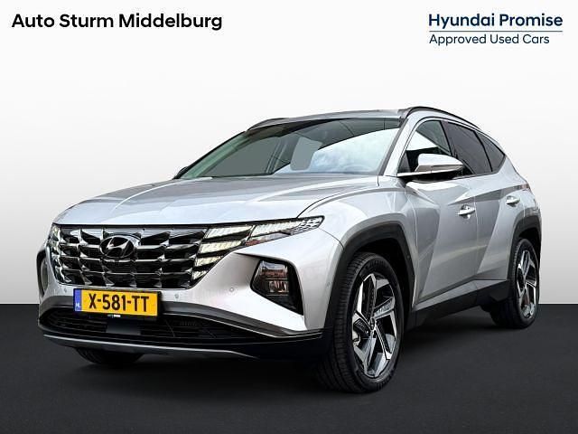 Shimmering silver Gebruikt 2024 Hyundai Tucson Premium SUV | € 39.390 (Eerlijke prijs) - Afbeelding 1/1