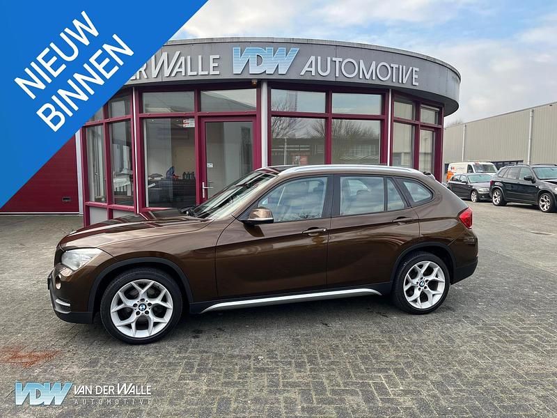 Bruin (metallic) Occasion 2012 BMW X1 xLine SUV | € 8.499 (Eerlijke prijs) - Afbeelding 1/4