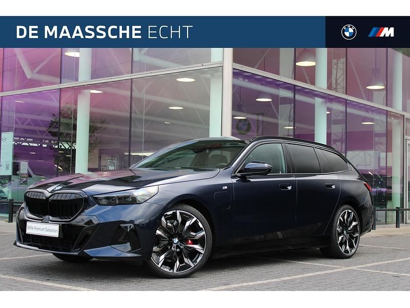 Blauw Gebruikt 2025 BMW 530e M Sport Stationwagen | € 100.090 - Afbeelding 1/4