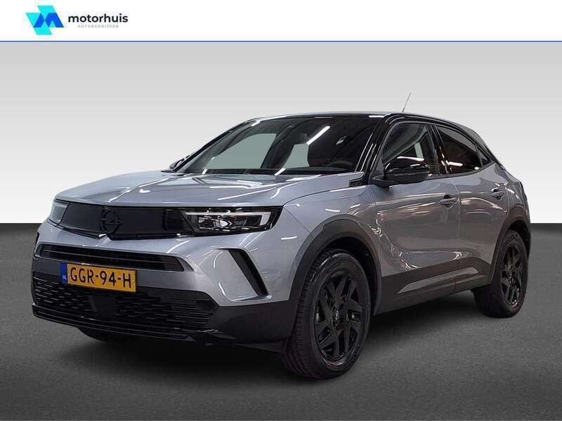 Grijs Gebruikt 2024 Opel Mokka SUV | € 27.945 - Afbeelding 1/4