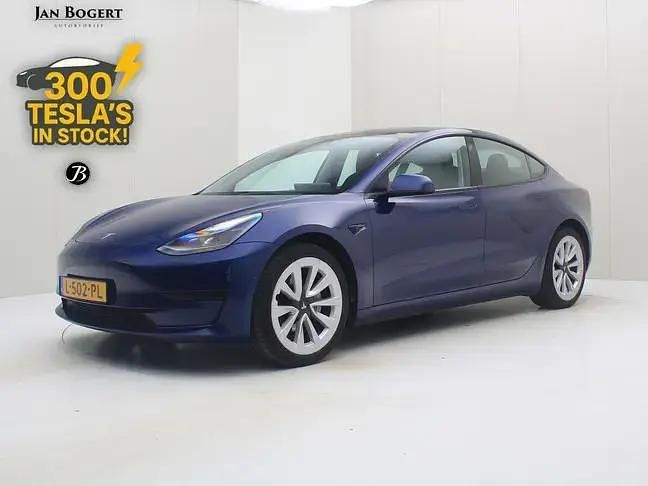 Blauw Gebruikt 2021 Tesla Model 3 Standard Range Sedan | € 23.400 (Eerlijke prijs) - Afbeelding 1/4