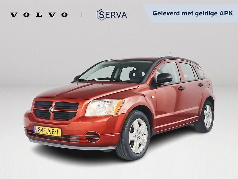 Oranje Gebruikt 2010 Dodge Caliber Hatchback | € 2.750 (Eerlijke prijs) - Afbeelding 1/4