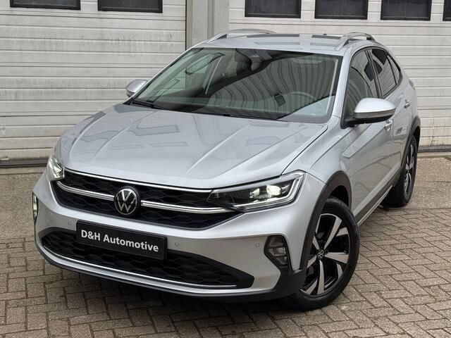 Grijs Gebruikt 2023 VW Taigo Style SUV | € 22.900 (Goede deal) - Afbeelding 1/4